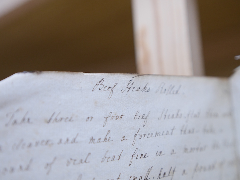 An 18th century hand inscribed book of recipes for M. Tennant. Condition - fair